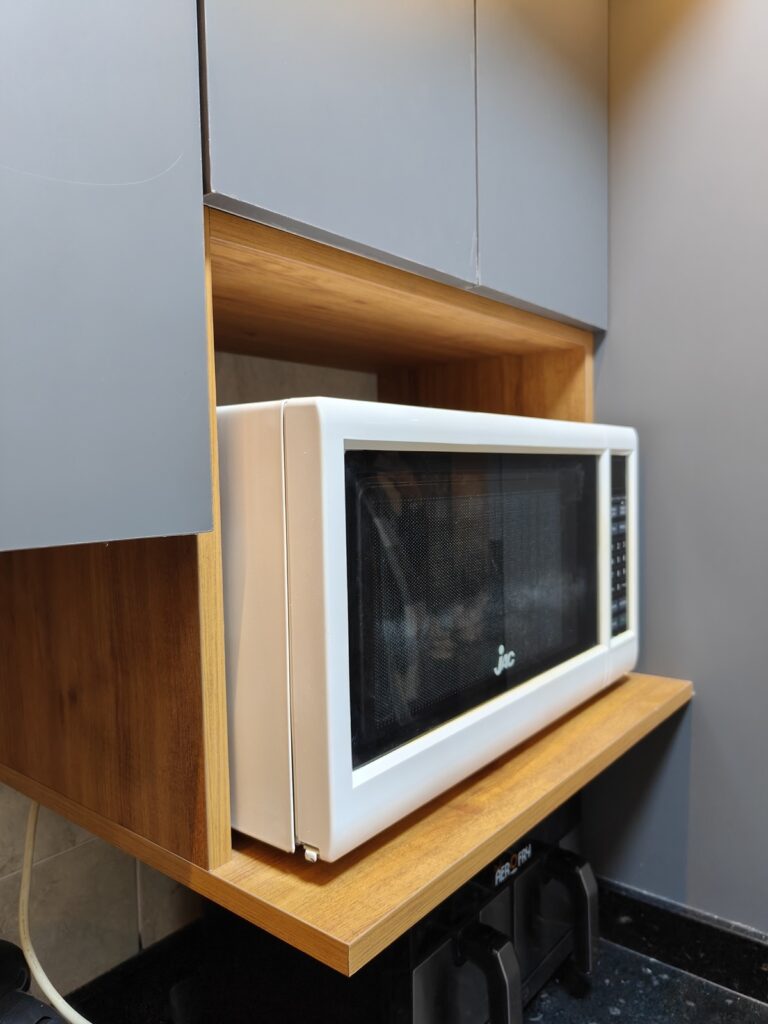 Kitchen cabinetry and storage details completed by Topniture.