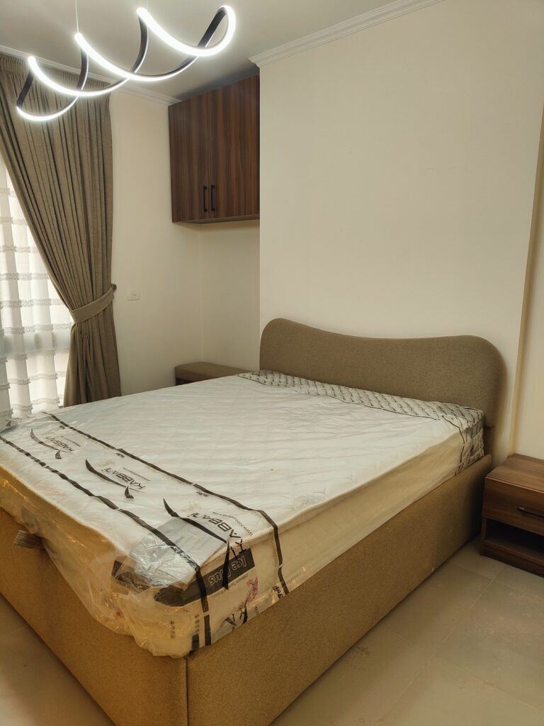Additional angle of a completed master bedroom furniture project by Topniture.