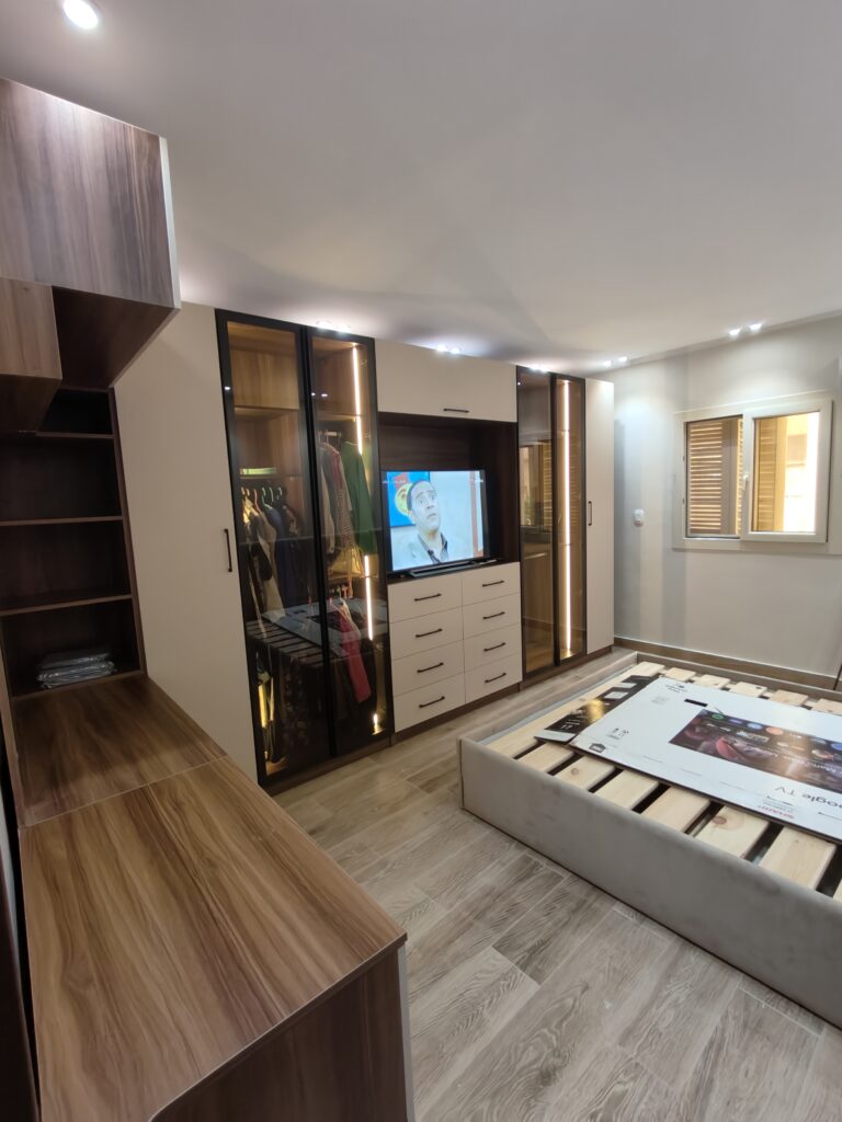 Custom fitted bedroom storage and wardrobe installed by Topniture